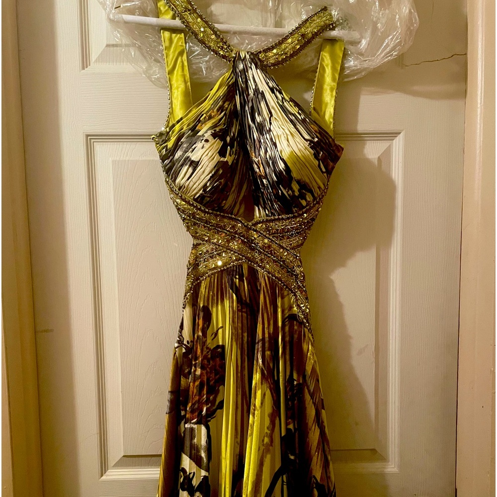 Multi colored prom dress by Jovani size 8.  Peach dress by Hailey Logan size 3/4